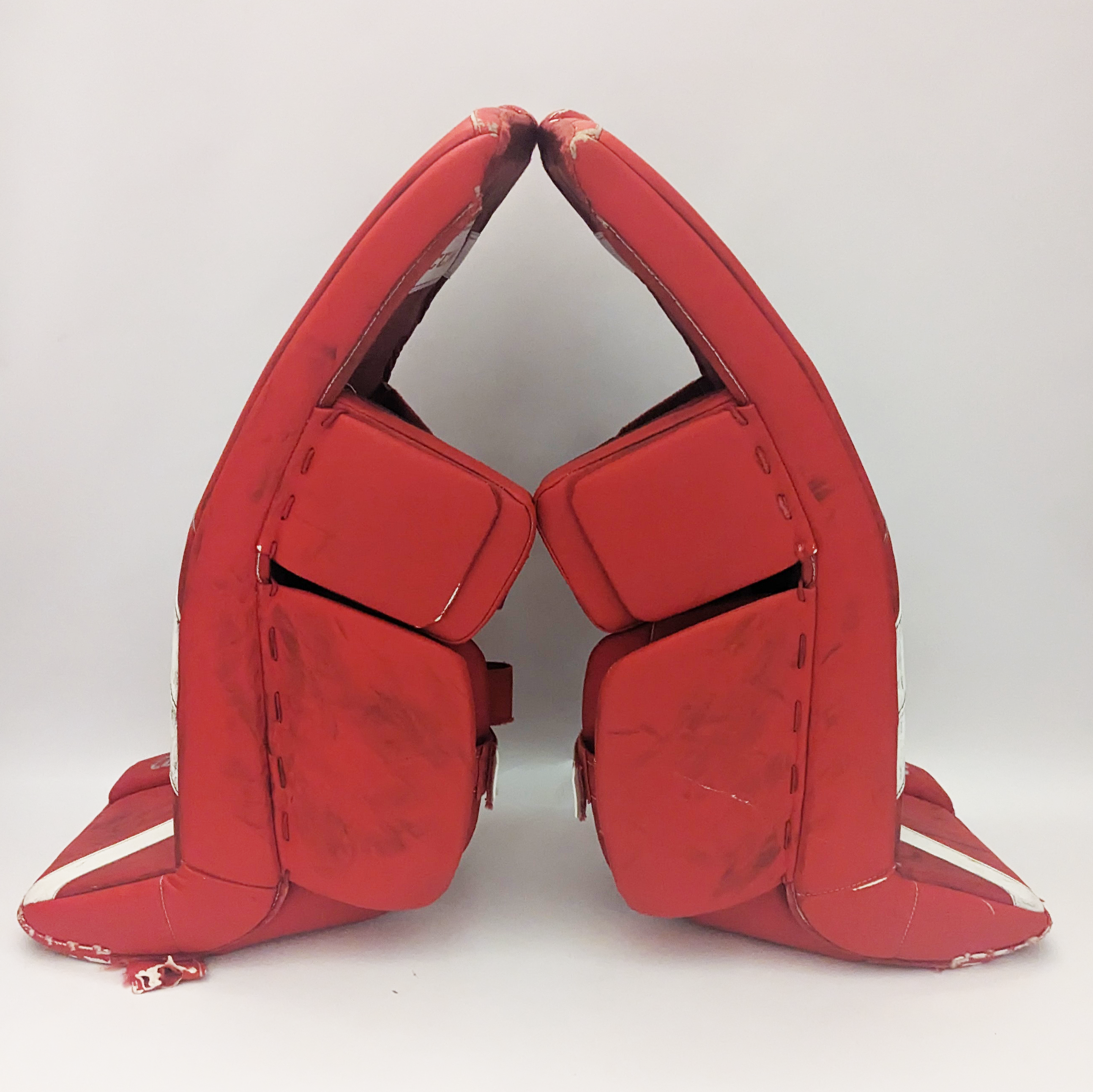 CCM AXIS - Jambières de gardien de but Pro Stock d'occasion (rouge/blanc)